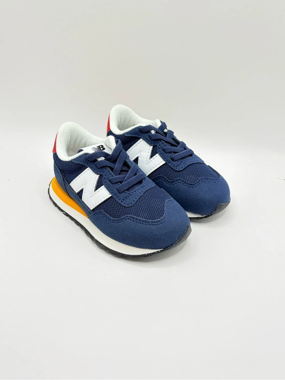 New Balance 237 Bungee Navy Kids Sneakers with White 'N' and Red Heel